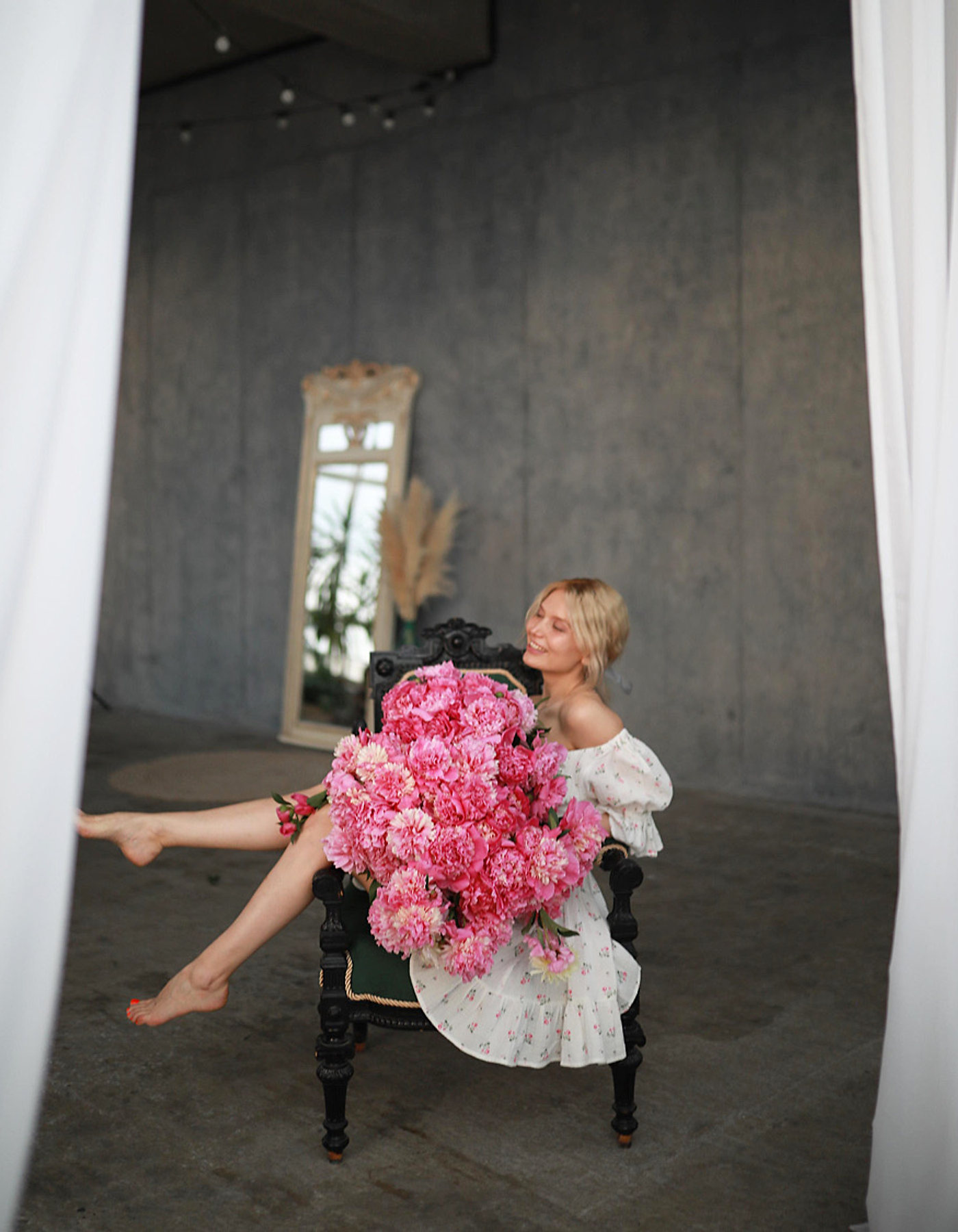 Lead designer of The Golden Moment with pink floral decor