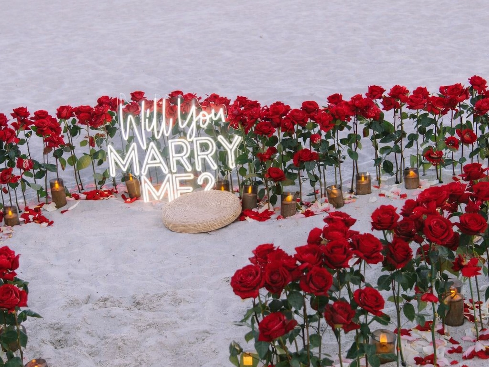 Beach Bloom heart made from red roses and candles