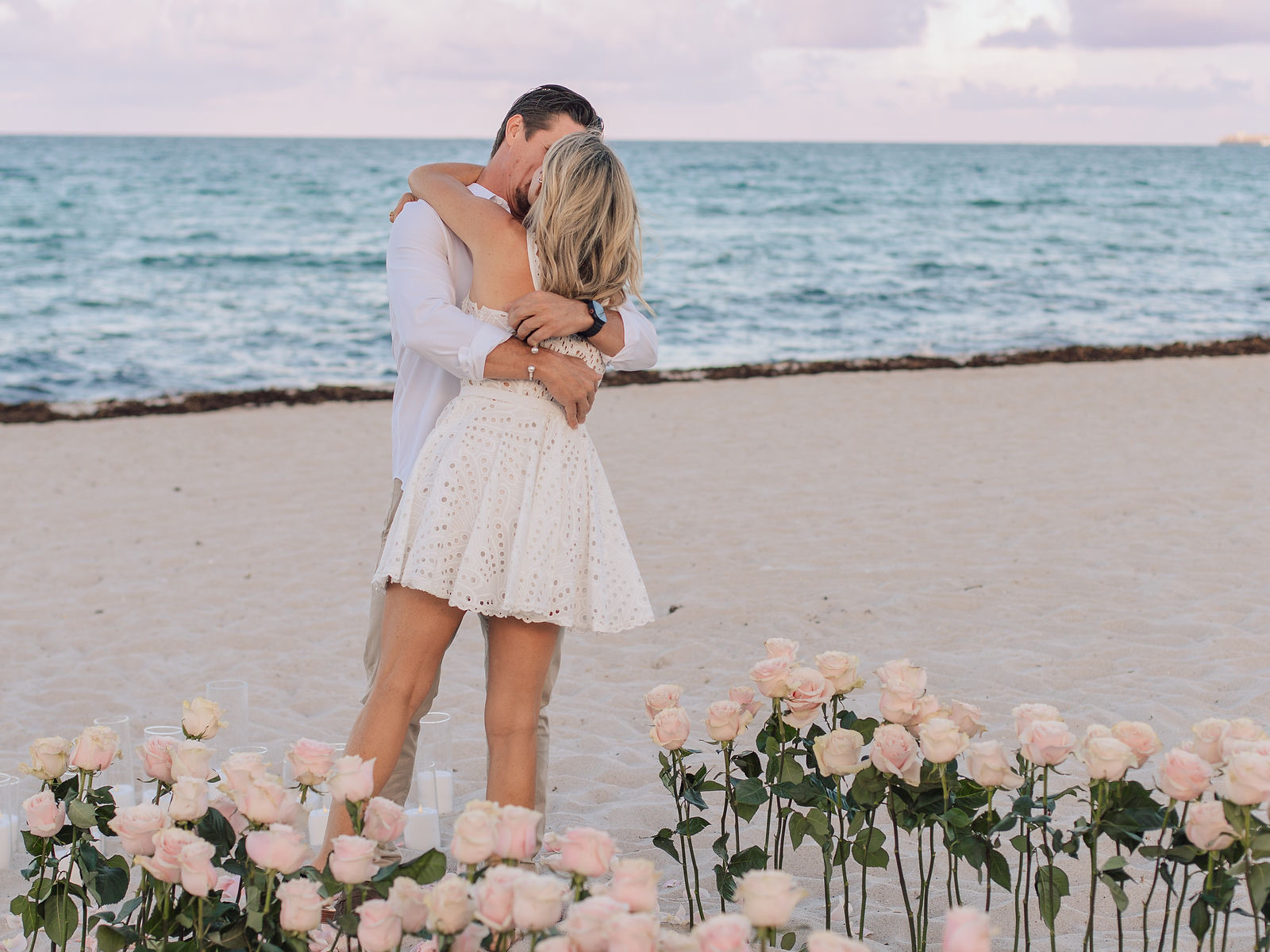 Couple celebrating their Tender Luxury proposal